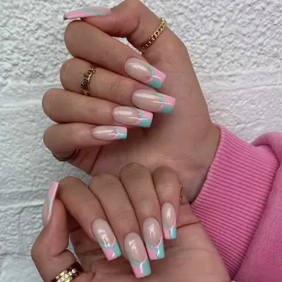 graphic pink and blue French manicure