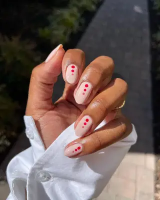 Monochrome polka dot nails. 