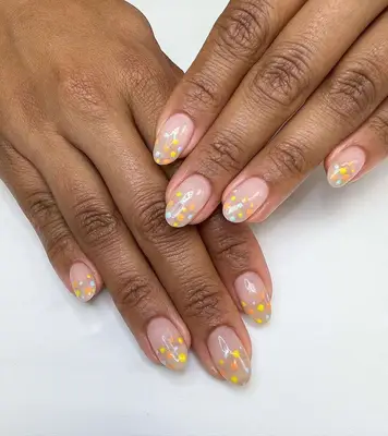 A dotted French manicure. 