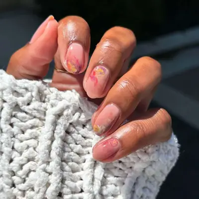 Natural nails with watercolor brushstroke design