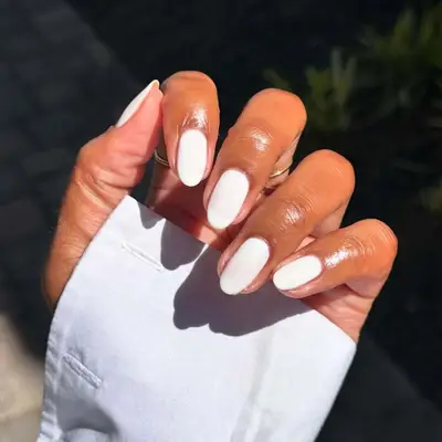 Natural nails with milky white polish
