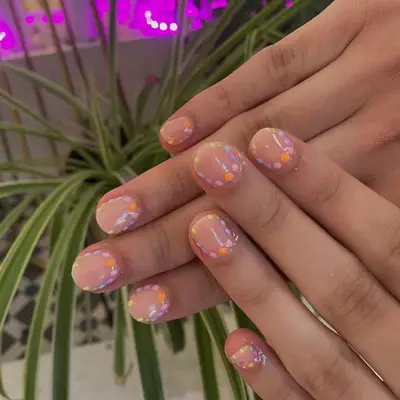 Short nails with pastel polka-dots