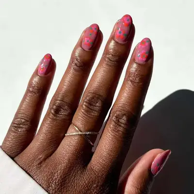 Manicure with mauve and pink floral design