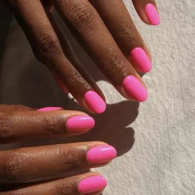 Short nails with hot pink polish