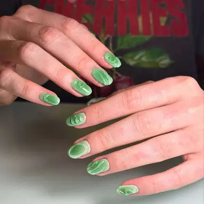 Green nails with clear textured design