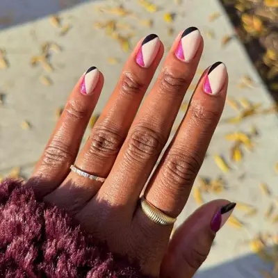 Manicure with chevron design in contrasting colors