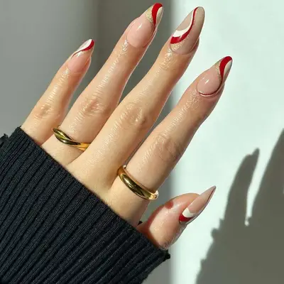 red and gold swirl nails
