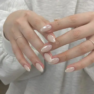 nude chrome nails closeup