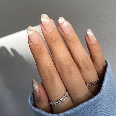 white cloud pink nails manicure closeup