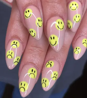 rainbow nails with smiley face stickers
