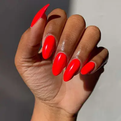 red manicure on medium length nails