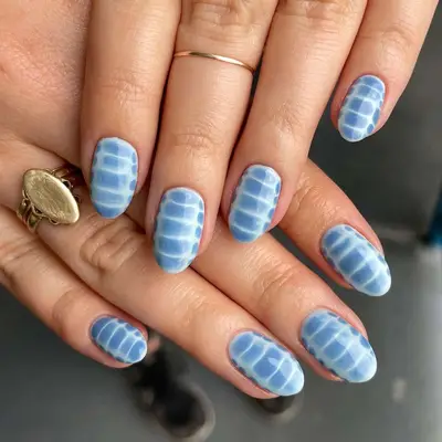 blue croc print manicure