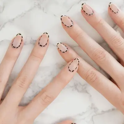 nails with black dotted lines
