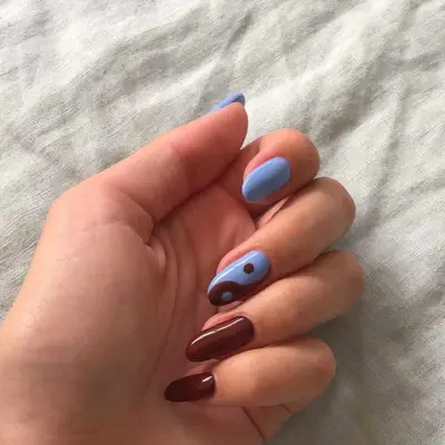 blue and brown nails with yin and yang design