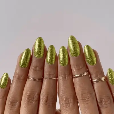 Chrome green nails with bubble accents