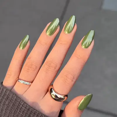 Long almond nails with chrome olive green polish