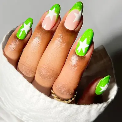 bright green french nails with white stars