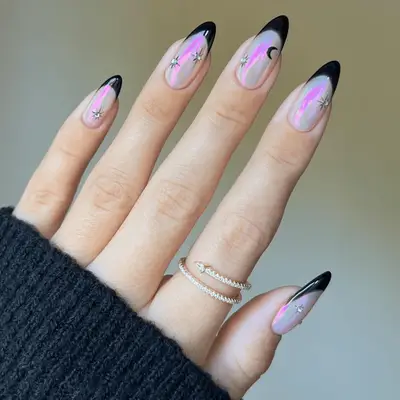 Holographic celestial manicure with black French tips