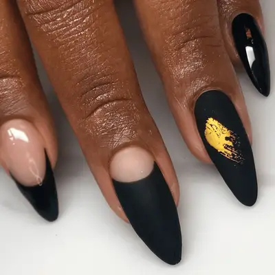Black matte French tips with gold streak