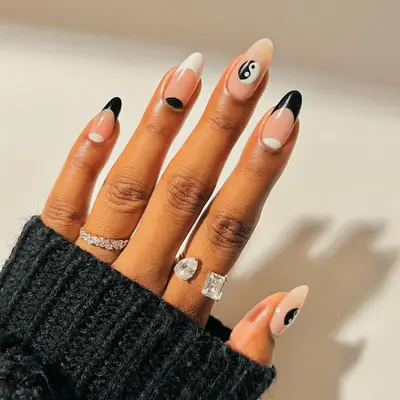 Black and white French manicure with yin-yang