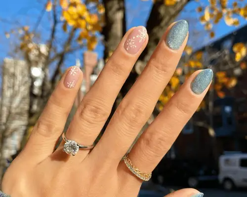 snowflake accent manicure