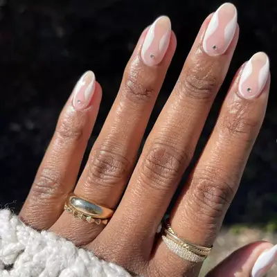 White and beige nails with rhinestones