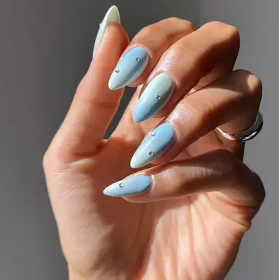 blue ombrÃ© nails with rhinestones
