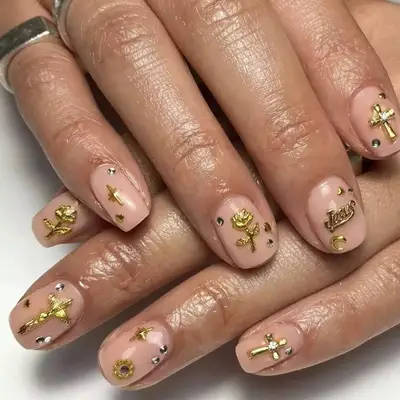 charm and rhinestone nails