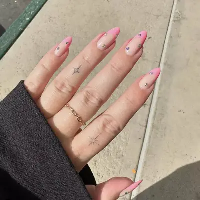 pink french mani with rhinestones