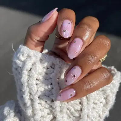 pink marble nails with rhinestones