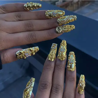 baroque style gold nails with rhinestones