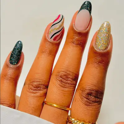 festive gold, green, and red french nails