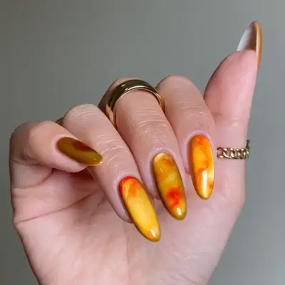 an amber velvet glass manicure