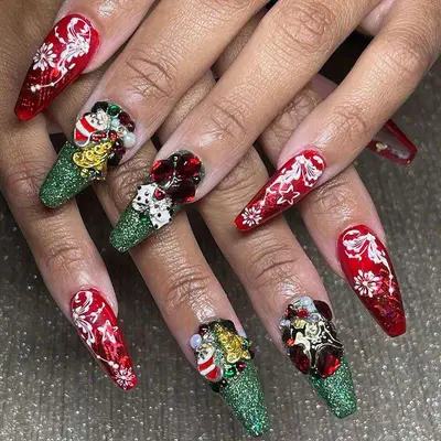 Holiday acrylic manicure with red and white patterns and green glitter nails with gold details