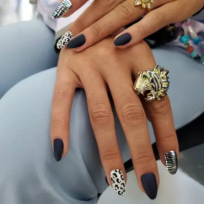 Black matte and animal print nails