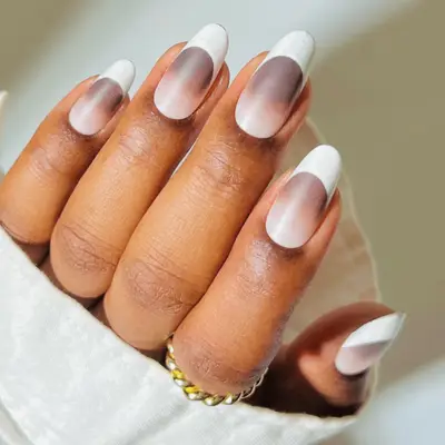 Matte rounded manicure with white french tips and mocha gradient