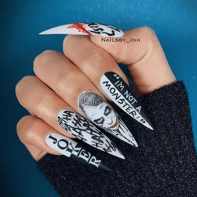 joker themed stilletto nail manicure