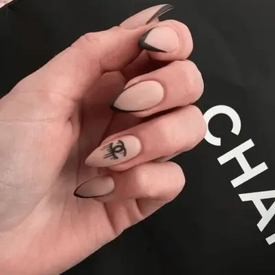 Chanel-inspired almond stilletto manicure