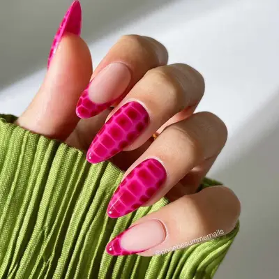 Pink and burgundy snake print nails with French tip accents