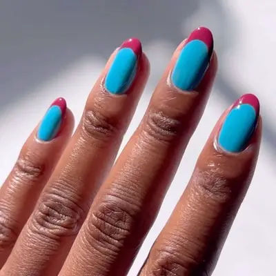 Mixed Berry French mani with blue base and berry tips 