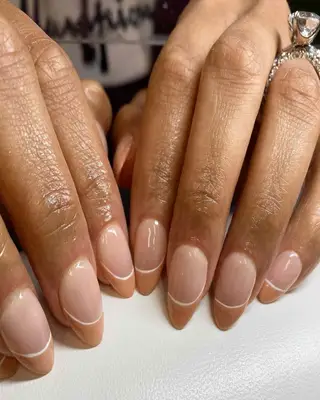 French manicure with tan tips with white strips