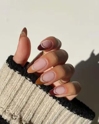 A French manicure with coffee colors 