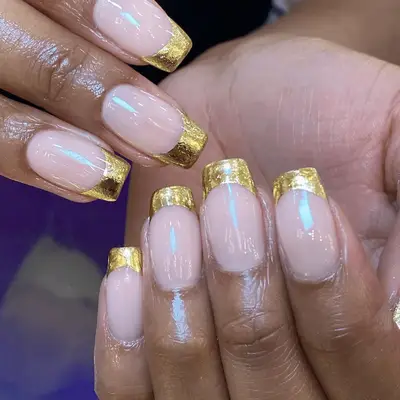 Gold tipped French manicure