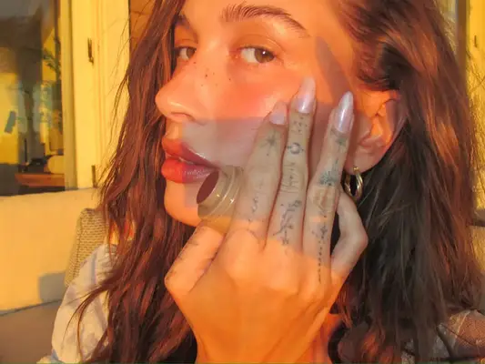 Hailey Bieber with pearly nails