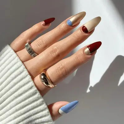 Jewel-toned half moon manicure