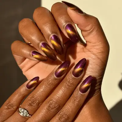 Purple and gold moonstone nails