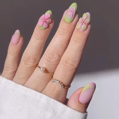 nails with pink and green 3d flowers