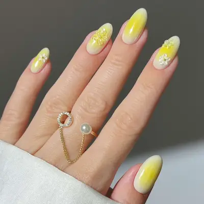 butter yellow nails with 3d flowers