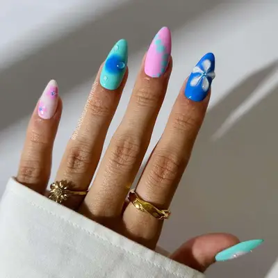 pink and blue nails with 3d flowers