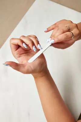 how to apply fake nails